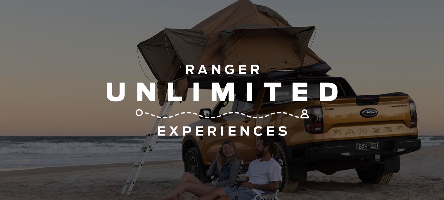 Ford Ranger parked on beach with canopy open 