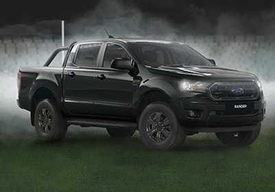 True Red 2021 Ford Ranger Sport parked on grass in stadium